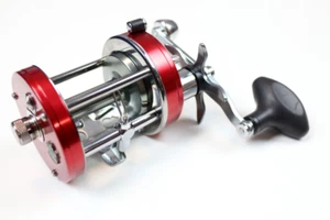 NEW ABU GARCIA AMBASSADEUR 7001C REEL LEFT HAND WIND FREE SHIPPING - Picture 1 of 2