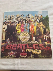 Beatles SGT Peppers Lonely Hearts Club Band ( Bonus plastic cover ) - Picture 1 of 4