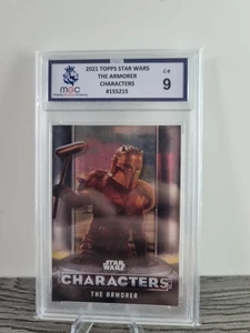 2021 Topps Star Wars The Armorer Mgc 9 - Picture 1 of 3