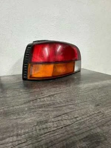 1991-1992 Geo Storm OEM LH Driver Side Tail Lamp - Foto 1 di 5