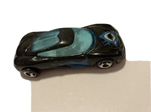 Hot Wheels Black Chrysler Thunderbolt with Blue Shark, Made in Thailand - Picture 1 of 6