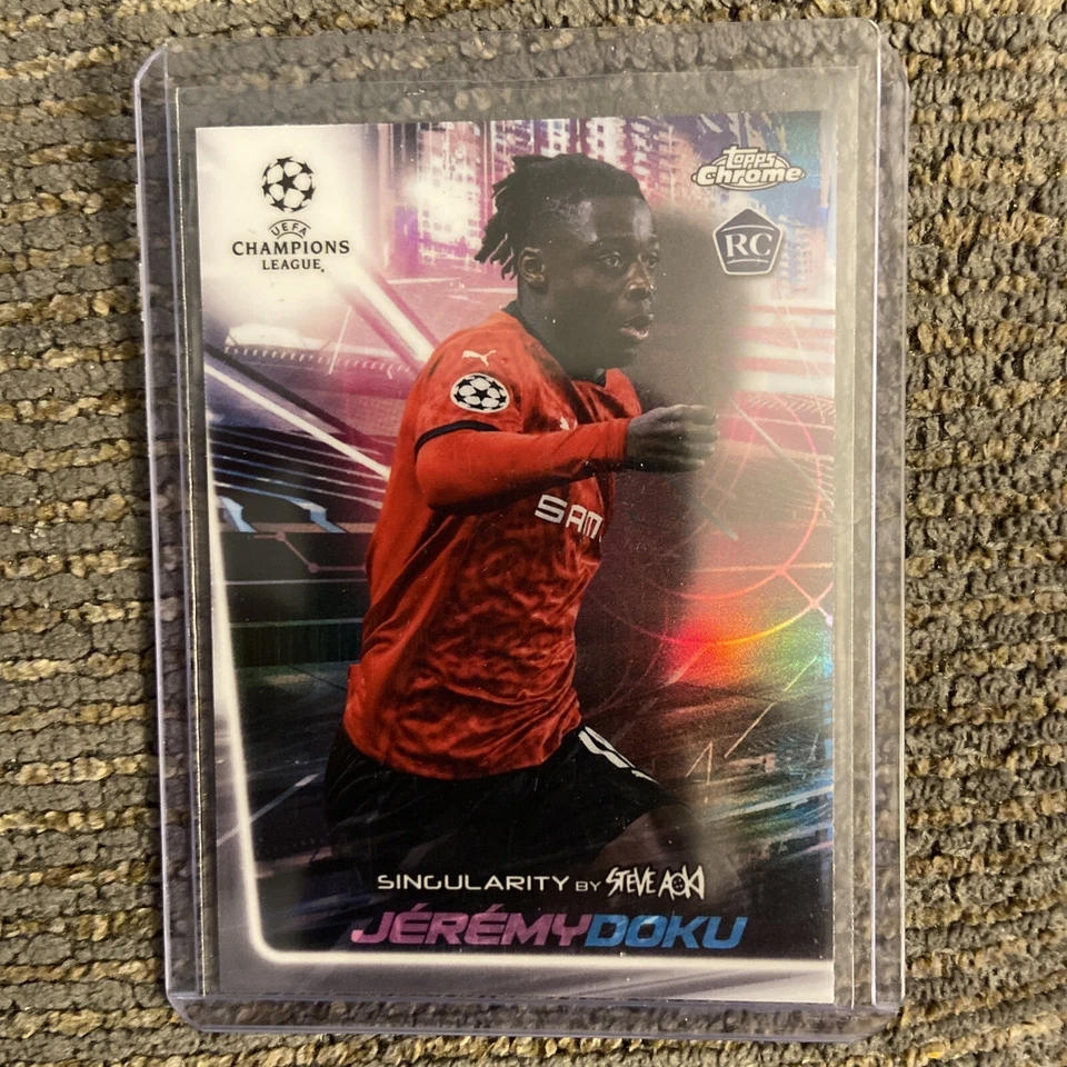 2020-21 Topps Chrome X Steve Aoki UCL Singularity Jeremy Doku #S-JD Rookie RC - Image 1 of 1
