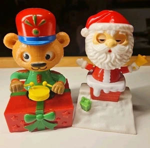 Paar Weihnachts-Solarbobbler von Weihnachtshaus Weihnachtsmann & Trommlerbär - Bild 1 von 5