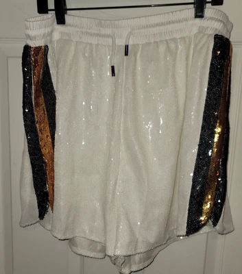 PANTALONES CORTOS REINA DE LOS DESTELLOS BLANCO CON RAYAS NEGRAS Y DORADAS TALLA 2XL Foto 1 de 4