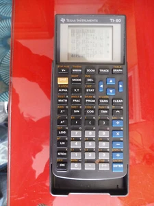 Calculatrice Texas Instruments TI - 80 scientifique graphique Calculator - piles - Photo 1/1