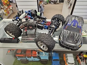 Traxxas Revo Nitro truck OS21Tm - Picture 1 of 6