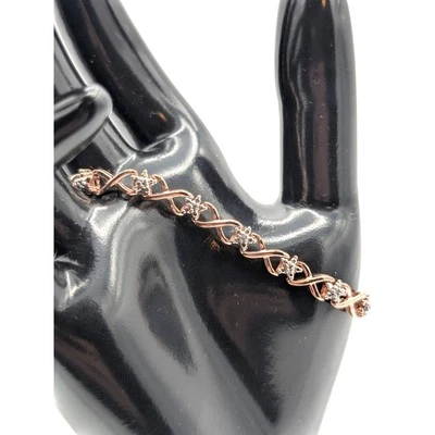 Brazalete estrella diamante redondo de plata de ley de 0,10 quilates de oro rosa  Foto 1 de 4