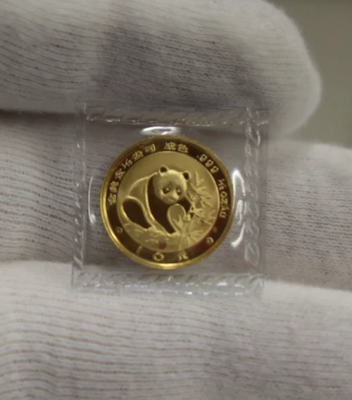 Monedas de oro panda China 1988 1/10 10 yuanes gema sellada en plástico Foto 1 de 2