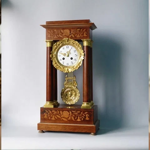 Portico-style clock. Rosewood, maple. France, Charles X 51 cm. (109) Cover