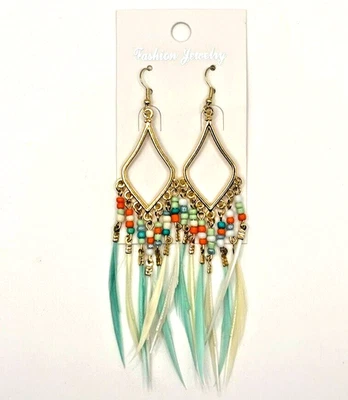 Pendientes colgantes blancos como nuevos sin etiquetas con borla de plumas de semillas de naranja con borla tono dorado Foto 1 de 4