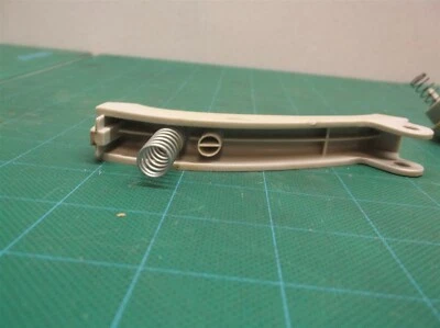 Trigger & Safety release buttons w springs off UT44110b Homelite 17" trimmer - Image 1 of 4