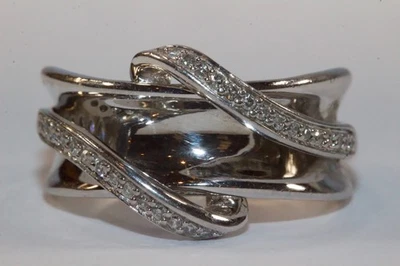 Anillo de derivación de diamantes blancos de corte redondo real de plata de ley 925 Sun talla 6,5 Foto 1 de 4