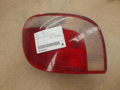 TOYOTA ECHO LEFT TAILLIGHT NCP10R, HATCH, LENS# 52-004, 10/99-09/02 99 00 01 02 - image 1 of 2