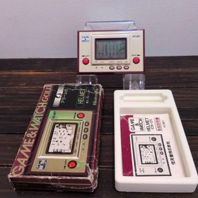 Helmet doesn't leak, box with instructions, Nintendo game watch #a60838