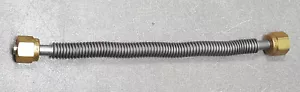 Tubo flexible de 1⁄4"" de acero inoxidable de 7 pulgadas. - Imagen 1 de 5