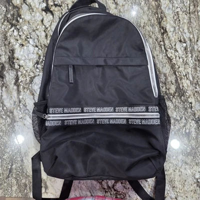 Steve Madden Back Pack  Black W/White Trim  Steve Madden Logo Adjustable Straps  - Image 1 of 4