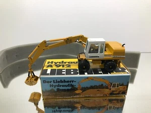 CONRAD 2822 LIEBHERR A912 HYDRAULIC WHEEL EXCAVATOR BAGGER -1:50- GOOD IN BOX - Picture 1 of 8