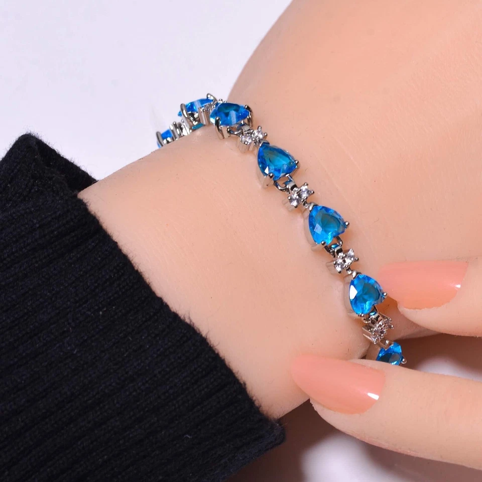 Brazalete Tenis Topacio Azul Simulado Corte Corazón 10 Ct Chapado en Oro Blanco 14K Foto 1 de 4