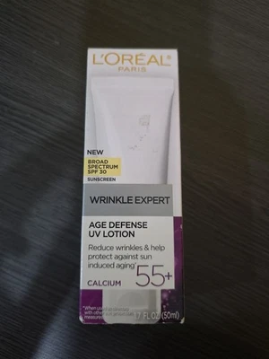 Nuevo en caja L'Oreal Paris Wrinkle Expert 55+ Loción de defensa de la edad FPS, reduce las arrugas Foto 1 de 4