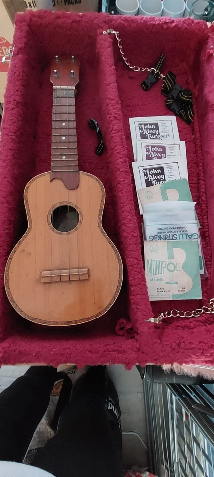 Old ukelele WITH ASSORTMENT OF STRINGS, AND CASE. - Image 1 of 1