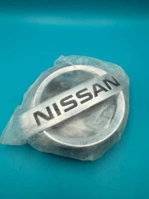 Nuevo OEM 2007-2012 Nissan Altima emblema delantero parrilla insignia logotipo 62890-JA000 Foto 1 de 4