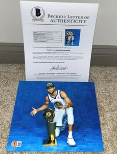 STEPHEN CURRY SIGNED 8X10 PHOTO GOLDEN STATE WARRIORS NBA CHAMPIONS MVP BAS - Picture 1 of 1