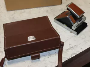 Fotocamera land vintage Polariod SX-70 Alpha 1 con custodia in pelle - Foto 1 di 3