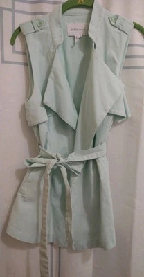 Chaleco gabardina sin mangas BCBGeneration corbata delantera alta talla baja pequeña Foto 1 de 4