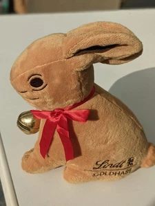 Lindt Goldhase mit goldener Glocke und Reißverschlusstasche, Plüschtier ca. 25cm - Bild 1 von 3