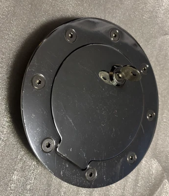 Puerta de gas cromada GD-201 USADA con cerradura .97-03 Ford F-150. 99-06 f-250 Superduty. Foto 1 de 4