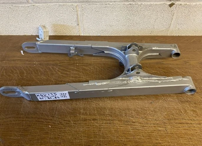 KAWASAKI GENUINE ORIGINAL  SWING ARM KDX175-A 33001-1069 "NEW" - image 1 of 1