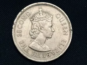Moneda de Hong Kong 1960 Gran Bretaña Reina Isabel II León de un dólar - Imagen 1 de 14