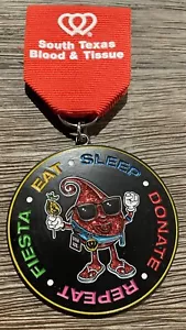 NEW SA Fiesta Medal 2022 “South Texas Blood & Tissue - Holding Chicken On STICK! - Picture 1 of 2