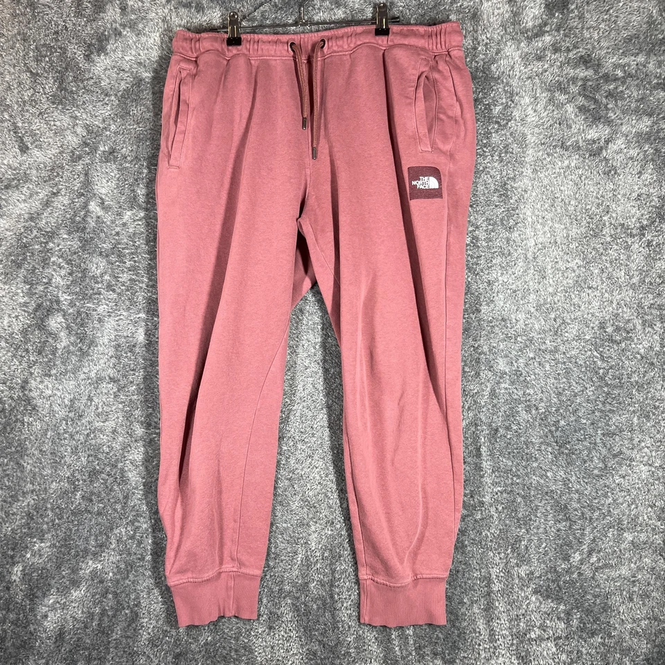 Pantalones deportivos The North Face para mujer grandes rosas forrados de vellón con logotipo bolsillos Foto 1 de 4