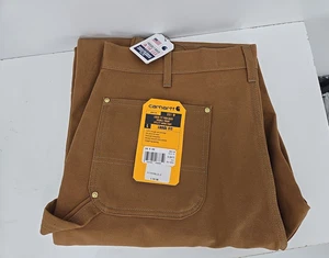 Pantalones de trabajo utilitarios de lona marrón doble rodilla calce suelto 38 x 36 CARHARTT para hombre nuevos con etiquetas - Imagen 1 de 4
