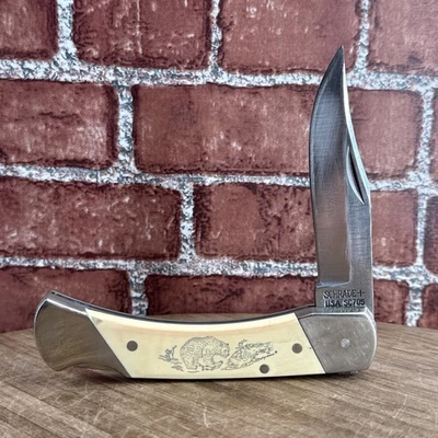 Navaja de bolsillo Schrade USA SC705 Scrimshaw Lockback usada Foto 1 de 4