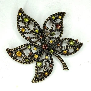 Broche prendedor vintage de diamantes de imitación Avon hoja de bronce pieza distintiva - Imagen 1 de 5