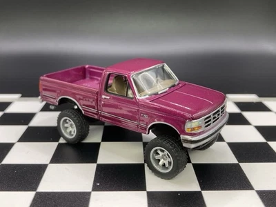 Camión Ford F-150 1993 elevado 4x4 1/64 diecast personalizado Johnny Lightning Pickup Foto 1 de 4