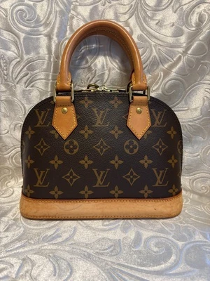 Bolso de Mano Louis Vuitton Alma BB Monograma Lona Marrón M53152 Auténtico Usado Foto 1 de 4