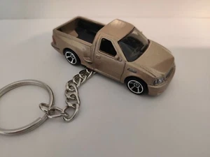 1999 ford f-150 svt lightning Keychain Brand New Gold Truck Step Side Ltd Ed 🎁 - Picture 1 of 2