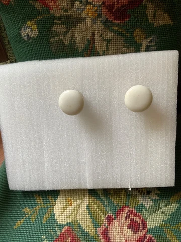Pair of antique milk glass pulls Cover