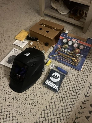 Miller Digital Elite Welding Helmet & Uniweld NEW Welding Supplies  - Image 1 of 4