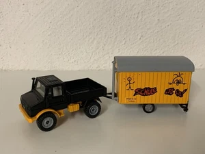 Siku Super 1:55 Unimog U1500 Mit Bauwagen 2533 Baustelle Gelb Weihnachten - Bild 1 von 11