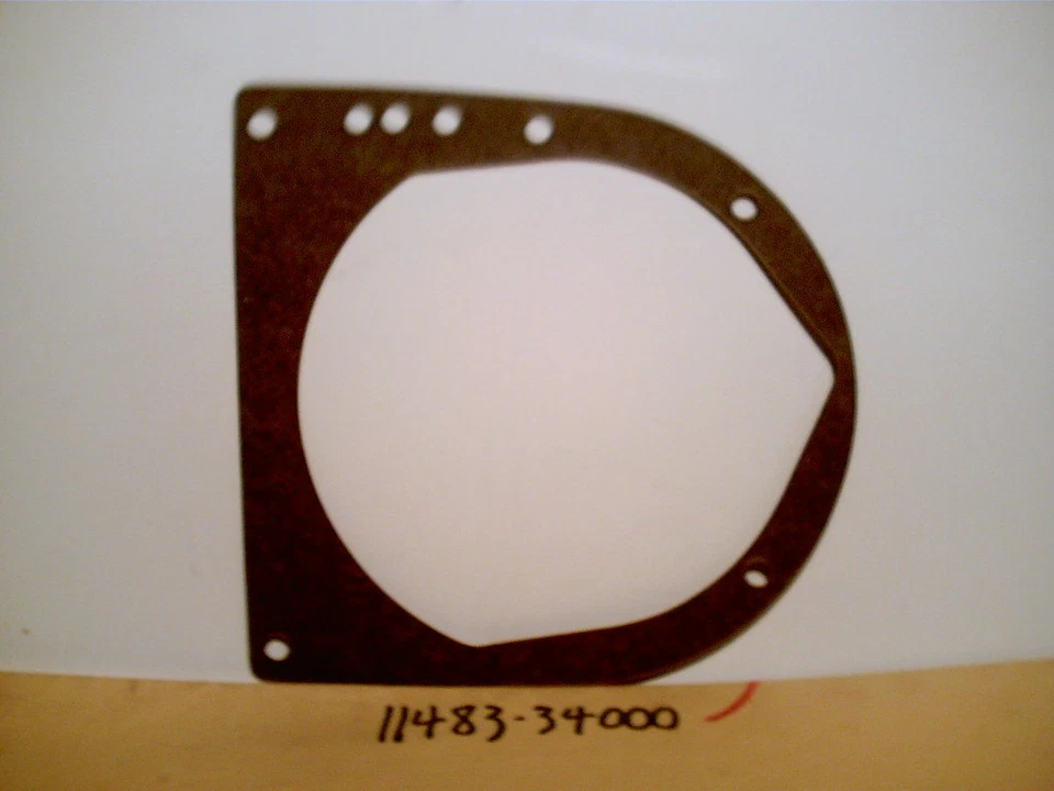 GT550 1972 - 1977 NOS OEM JUNTA CUBIERTA IZQUIERDA 11483-34000  Foto 1 de 1