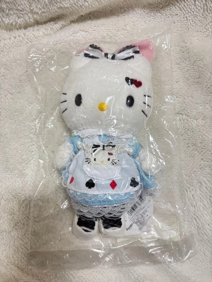 Peluche Alice au pays des merveilles Hello Kitty robe bleue oreilles de... - Photo 1/4
