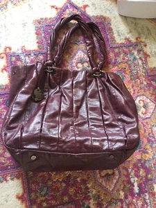 *Donald J Pliner* Hermoso Bolso de Mano de Cuero Ciruela Púrpura Sangre de Buey Mediano Usado en Excelente Condición - Imagen 1 de 6