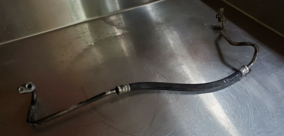 Tubo de manguera de aire acondicionado Cadillac SRX 2004-2009 maletero trasero usado OEM Foto 1 de 4