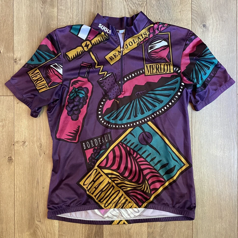 Camiseta deportiva de ciclismo Sugoi con gráfico de vino estampado en todas partes cuartos bolsillos con cremallera años 90 vintage Foto 1 de 4
