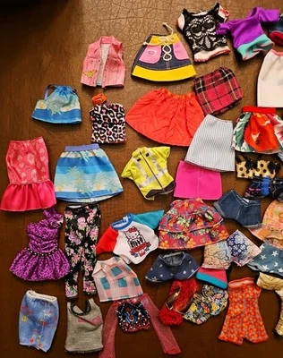 Mixed Lot of Doll Clothes Barbie, Non-Barbie - Image 1 of 4
