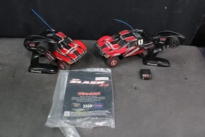 TWO TRAXXAS Slash 1/16-Scale4WD Short Course Trucks 184 - Picture 1 of 5
